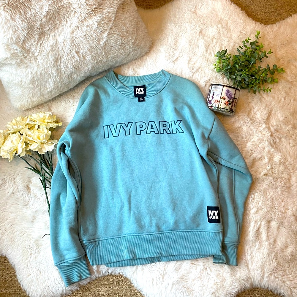 Light blue/teal Ivy Parks pullover sweatshirt in women’s extra small.
